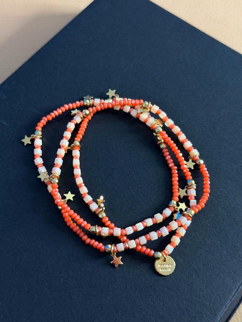 Marlyn Schiff - Beaded Bracelet Burnt Orange White & Gold Star Charms Summer